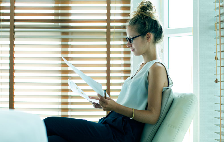 woman reading documents