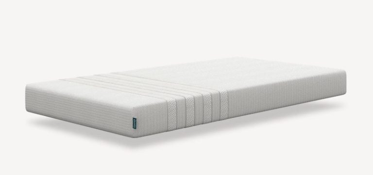 Image of the Leesa Kids mattress, an off-white mattress with a green tag on a white background.